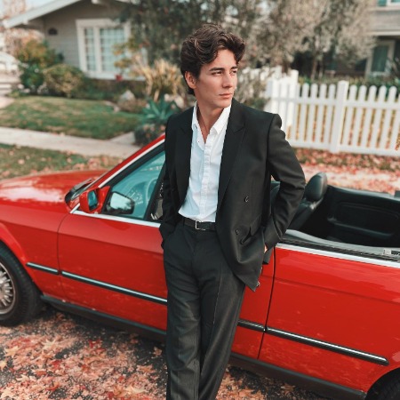 Chance Perez posed infront of the car